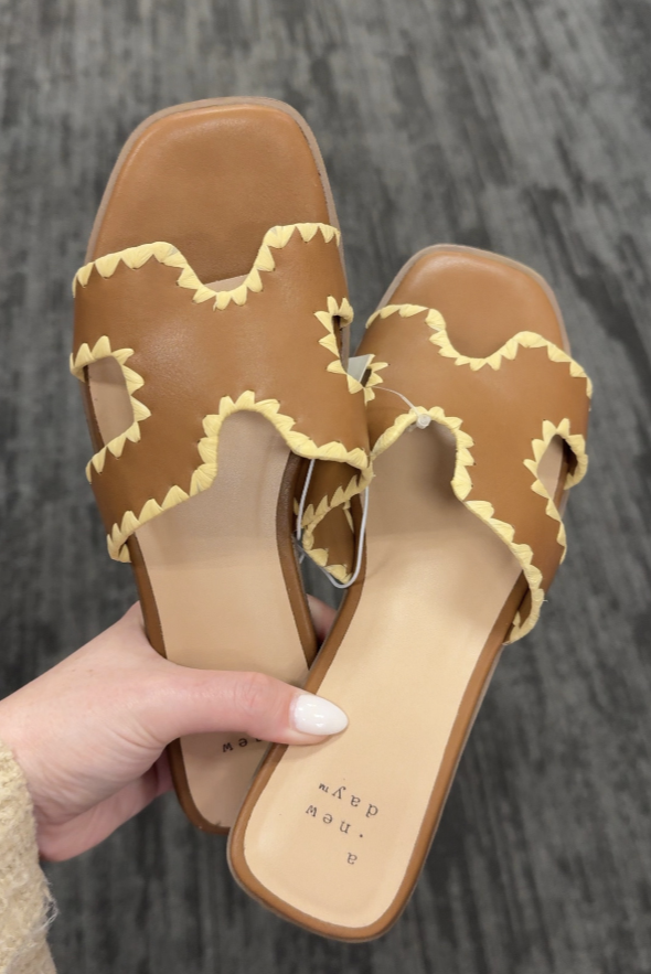 tan and gold stitching sandal